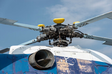 A close-up view of the helicopter rotor at the airport