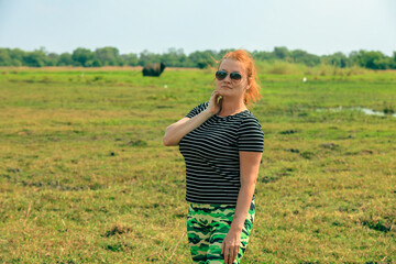 A traveler explores the lush landscapes of Botswana while enjoying a beautiful day in nature