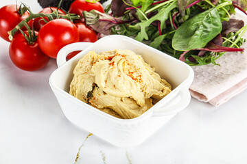 Creamy hummus in the bowl