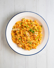 Rice paella with fresh tuna. Top view table.