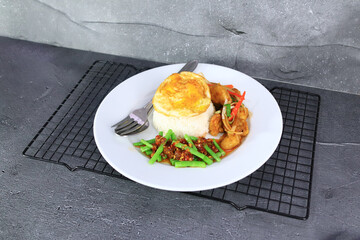 grilled steak with potatoes and rice