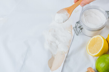 Eco-friendly remover coffee stain on white clothes using baking soda. Embracing a zero-waste lifestyle and save the planet. top view.