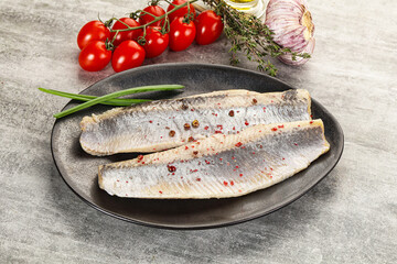 Marinated herring fillet with green onion