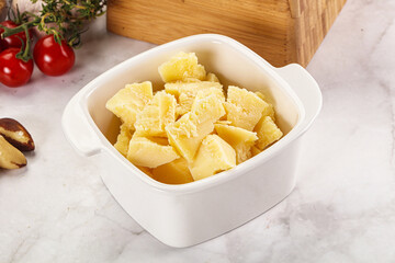 Crushed parmesan cheese in the bowl