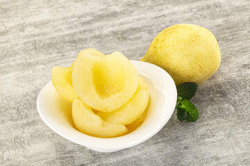 Canned yellow pear with syrup