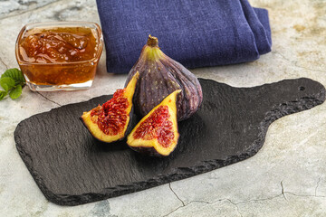 Purple ripe fig with cut