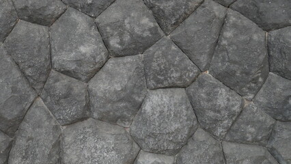 Grey rock stone texture background wall pattern, top view. Background design for dark wallpaper
