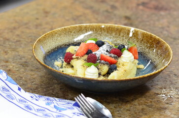 potato gnocchi with poppy seeds and cottage cheese, Czech traditional food, sweet food for children
