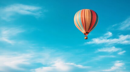 Naklejka premium Colorful Hot Air Balloon Soaring in Blue Sky with Clouds