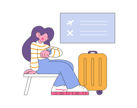 Woman with her suitcase sitting near airport tablo and looking at her watch