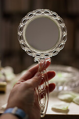 vintage mirror in hand