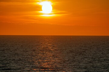 Latvia Rigas Gulf Jurkalne sunset into the sea in the clouds