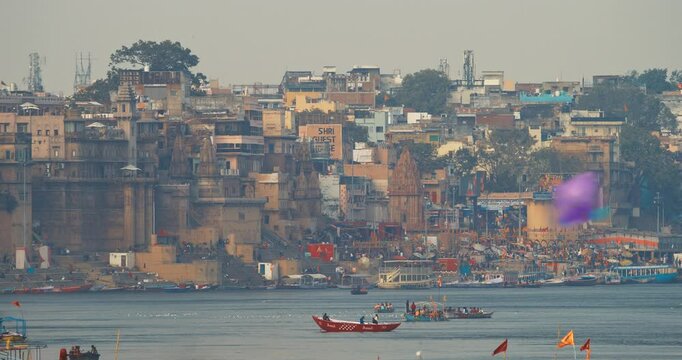 Varanasi, Uttar Pradesh, India. Boats Floating Near Rana Mahal Ghat, Darbhanga Ghat And Dashashwamedh Ghat In Early Morning. Many Hindu Temples. View From Riverbank Embankment