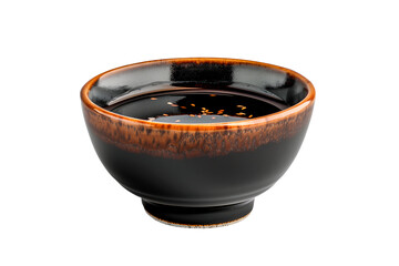 A porcelain dish containing dark soy sauce isolated on white transparent background.