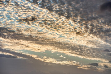 Beautiful vibrant sunset clouds with blue sky