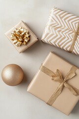 Christmas presents with recycled brown wrapping paper with stripes in gold colors, flat lay pattern