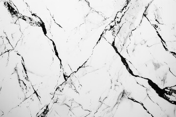 A white marble wall with black and grey swirls.,