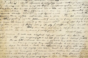 An intricate and beautifully handwritten text showcasing a classic cursive style on aged paper