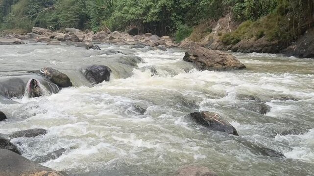 a strong river flow in one of the rivers in my village a