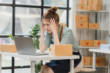 The Pressure of Small Business: A young woman, a small business owner, grapples with the demands of...