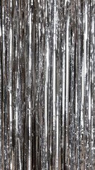 Obraz premium Holographic silver foil fringed curtain backdrop for festive event design