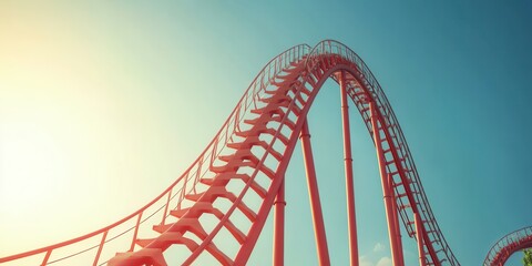 A vibrant roller coaster ascending against a clear blue sky, capturing the thrill and excitement of amusement parks.