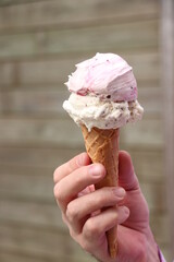 Man holding ice cream cone