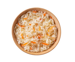sauerkraut with carrot in a wooden bowl isolated on white background. Top view.