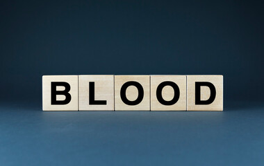 A conceptual image of the word BLOOD spelled out in wooden blocks