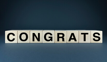 Spreading Joy: Wooden Letters Spell Congrats
