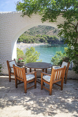 Roses, Spain - 9 Aug, 2024: Tables on the terrace at El Bulli restaurant, Cala Montjoi, Costa Brava