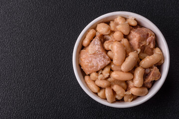 Cassoulet with white beans, meat and sausages, vegetables, salt and spices