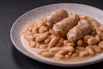 Cassoulet with white beans, meat and sausages, vegetables, salt and spices