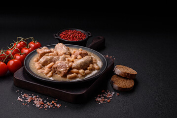 Cassoulet with white beans, meat and sausages, vegetables, salt and spices