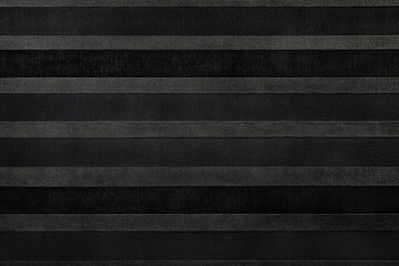 A black background with alternating stripes of dark charcoal and deep black, running horizontally. The slight color variation adds a subtle texture, creating a minimalist and elegant design that feels
