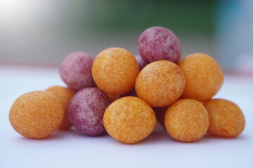 Deep fried sweet potato Balls. Concept, Thai street food. Fried food with high calorie and carbohydrate but delicious to eat as snack or dessert.                