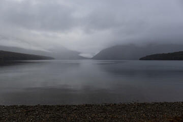 Foggy and cloudy view of Lake Rotoiti, New Zealand.