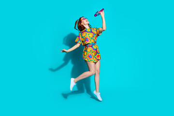 Full length photo of lovely young lady singing karaoke mic dressed stylish colorful garment...
