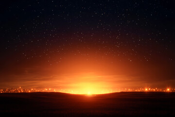 Obraz premium A stunning sunset illuminating the horizon, casting golden hues over the landscape, with twinkling stars above.