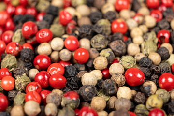 Background of a mix of colorful peppercorns
