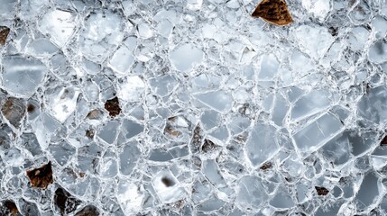 Obraz premium A fragmented ice surface, composed of jagged shards and crystalline edges, reflecting the sky in a mosaic pattern.