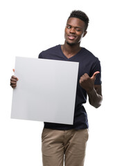 Young african american man holding a banner pointing with hand and finger up with happy face smiling