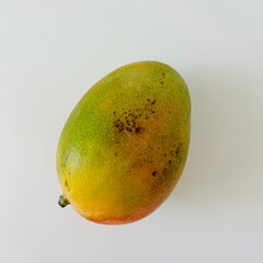 Ripe Mango Fruit Whole with Green Peel Isolated on White Background