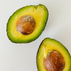 Avocado Cut in Half with Pit and Green Flesh