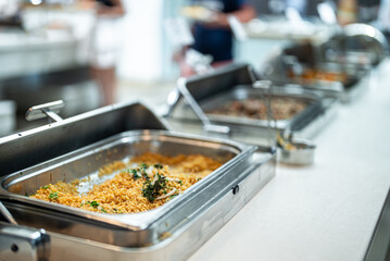 Couscous in a metal tray. All-inclusive concept.