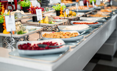 A variety of salads and meats. All-inclusive concept.