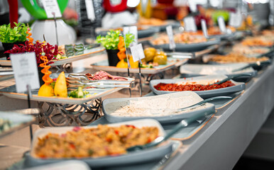 A variety of salads and meats. All-inclusive concept.