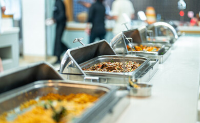 Meat goulash with vegetables in a metal tray. All-inclusive concept.