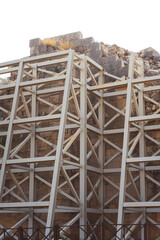 scaffolding near ancient wall restoration landmark