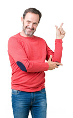 Fototapeta premium Handsome middle age hoary senior man wearing winter sweater over isolated background Looking proud, smiling doing thumbs up gesture to the side